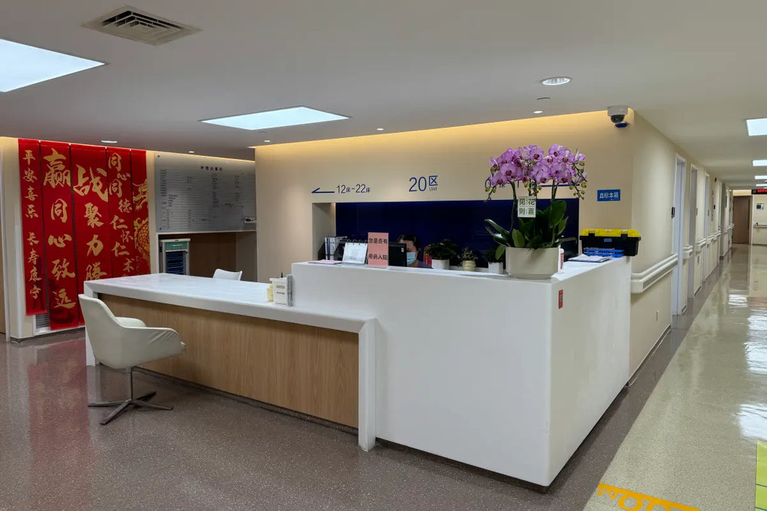 Modern multi-story medical building at Shanghai Tongren Hospital with glass windows and red — full body checkup shanghai