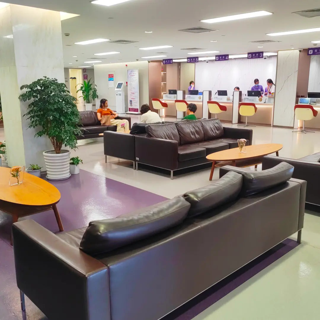 VIP and special-need health screening reception area with leather seating and nursing stations 3 to 6 inside Shanghai Tongren Hospital